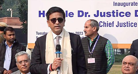 Chief Justice of India (CJI) Justice DY Chandrachud addresses the gathering at a health camp organised by the Supreme Court Bar Association at SC lawn, in New Delhi, Tuesday, Dec. 12, 2023. (PTI)