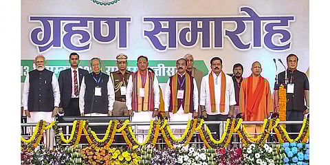 PM Narendra Modi with Chhattisgarh Governor Biswabhusan Harichandan, UP CM Yogi Adityanath and others during the oath ceremony of Chief Minister-designate Vishnu Deo Sai, in Raipur. (Photo | PTI)