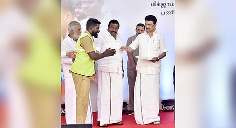 CM MK Stalin gives cash hampers to conservancy workers who aided relief and rescue efforts, on Tuesday | P Jawahar