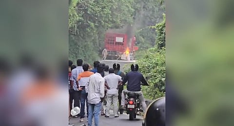 A lorry loaded with empty LPG cylinders caught fire at the wheels on Tuesday morning while descending from Coonoor to Kinathukkadavu on the Coonoor - Mettupalayam Ghat Road in Coimbatore district.