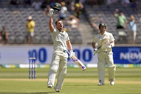 David Warner of Australia celebrates his century on the first day of the first Test between Australia and Pakistan in Perth (Photo | AP)