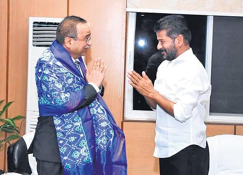 Telangana High Court Chief Justice Alok Aradhe and Chief Minister A Revanth Reddy greet each other at the MCRHRD Institute in Hyderabad on Thursday