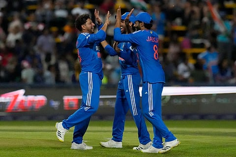 India's bowler Kuldeep Yadav, left, celebrates a wicket during the final T20 cricket match between South Africa and India on Dec. 14, 2023. (Photo | PTI)