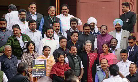Opposition lawmakers gather to protest with suspended MPs during the Winter session of Parliament, in New Delhi, Friday, Dec. 15, 2023. (PTI Photo)