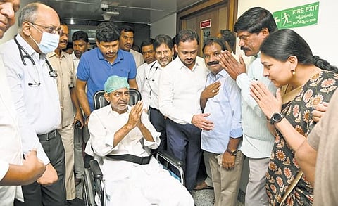 BRS president and former chief minister K Chandrasekhar Rao greets people  as he leaves Yashoda Hospital on Friday