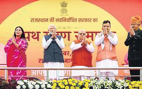 PM Narendra Modi with Rajasthan Governor Kalraj Mishra, CM-designate Bhajan  Lal Sharma during the swearing-in ceremony in Jaipur on Friday | pti