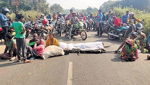 Rasgovindpur villagers blocking Jaleswar-Baripada road at Sharmula | express