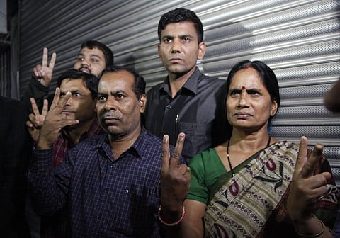 Nirbhaya rape and murder case victim's parents and others react after four men convicted of the crime were executed inside Tihar jail in Dwarka New Delhi Friday morning. (Photo | Anil Sh