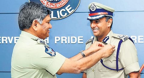DGP Kasireddy Rajendranath Reddy presented DGP Commendation Disc Medal to  Vijayawada City Police Commissioner Kanti Rana Tata on Saturday I Express