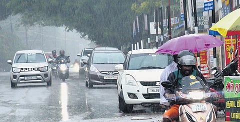 Commuters in Thanjavur had a troubled time negotiating the road due to rains