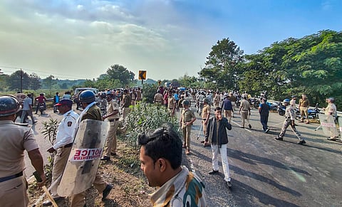 Police personnel disperse people gathered outside a manufacturing unit of Solar Industries after a blast occurred at the factory, at Bazargaon near Nagpur, Sunday, Dec. 17, 2023. (Photo | PTI)