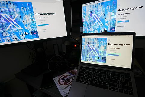 FILE - Computer monitors and a laptop display the X, formerly known as Twitter, sign-in page, July 24, 2023, in Belgrade, Serbia. (AP Photo)