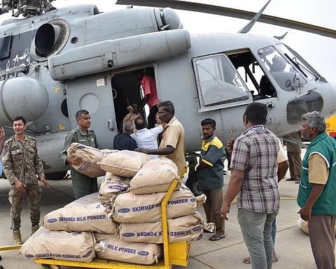 Coimbatore District administration sent food materials for flood-affected districts through choppers from the Sulur Airbase in Coimbatore on Monday | Express