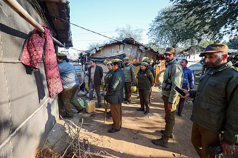 Police personnel during a search at a Rohingya camp, in Jammu on Tuesday, December 19, 2023.