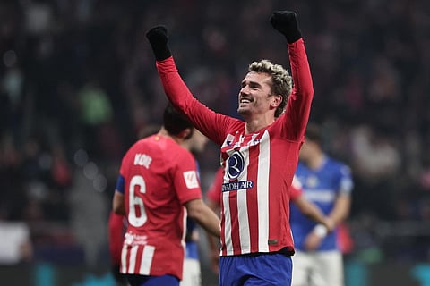 Atletico Madrid's Antoine Griezmann celebrates after scoring his team's third goal during the Spanish league football match against Getafe CF on December 19, 2023. (Photo | AFP)