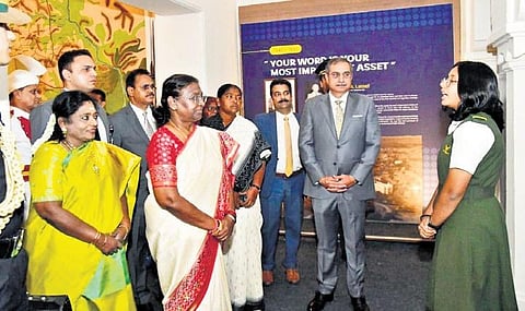 President Droupadi Murmu, accompanied by Governor Tamilisai Soundararajan and Women and Child Welfare Minister Dansari Anasuya, interacts with a student of the Hyderabad Public School in Begumpet on T