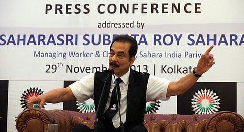 FILE - Sahara Group's late Chairman Subrata Roy gestures as he addresses a press conference in Kolkata on November 29, 2013. (Photo | AFP)