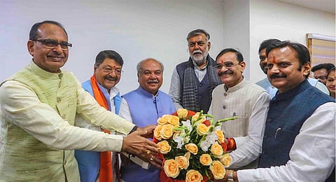 New Madhya Pradesh Assembly Speaker Narendra Singh Tomar being greeted by leaders during the Winter session of MP Assembly, in Bhopal, Wednesday, Dec. 20, 2023. (PTI)