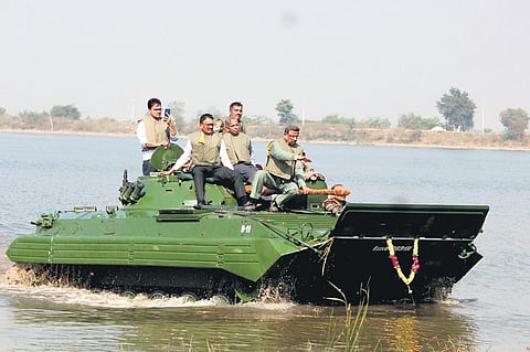 Ordnance Factory officials testing a battle tank in Malkapur pond of Kondapur Mandal in Sangareddy on Thursday.