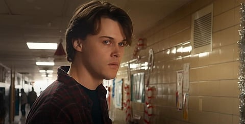 YouTube screengrab from the trailer of 'Mean Girls' (2024) starring Christopher Briney as Aaron Samuels.