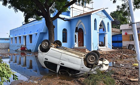A car wash out during the flood at Srivaikuntam in Tamil Nadu.  (Photo | V Karthikalagu, EPS)