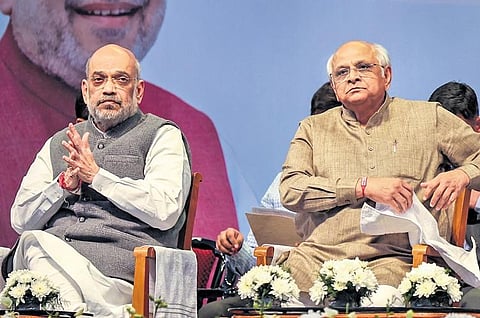 Home Minister Amit Shah, Gujarat CM Bhupendra Patel in Ahmedabad on Sunday | pti