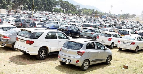 Large number of vehicles parked in Mysuru on Monday as the city witnessed a heavy rush of tourists because of the extended holidays | Udayashankar S