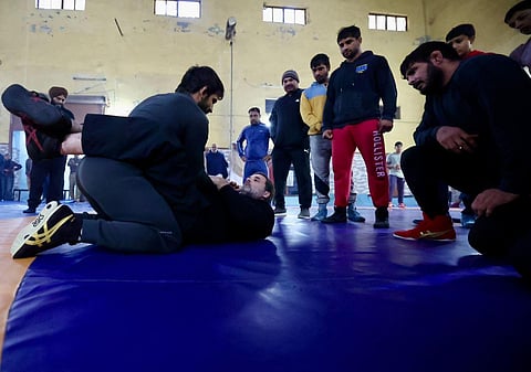 Rahul Gandhi and Wrestler Bajrang Punia in Haryana's Jhajjar district. (Twitter)