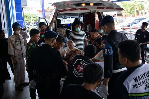 A Chinese worker who was injured in the explosion at a nickel smelter furnace is brought to the Morowali Regional General Hospital in Central Sulawesi. (Photo | AFP)
