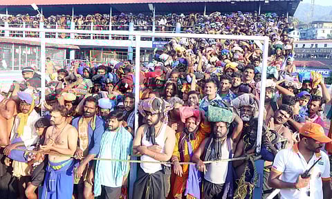 Ayyappa devotees waiting for darshan in front of holy steps at Sabarimala Lord Ayyappa Temple. (Photo | Shaji Vettipuram)