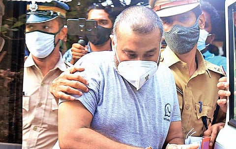 Sanu Mohan being taken to the Thrikkakara police station after being produced in the Judicial First Class Magistrate Court, Kakkanad. (File Photo | A Sanesh)