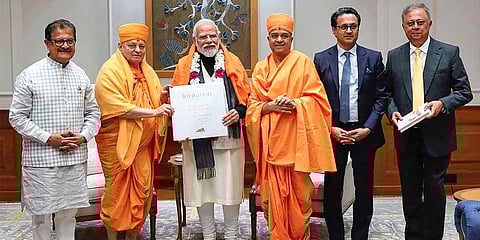 Prime Minister Narendra Modi accepts the invitation to inaugurate the BAPS Hindu Mandir, Abu Dhabi on the 14th of February, 2024, in New Delhi, Thursday, Dec. 28, 2023. (PTI)