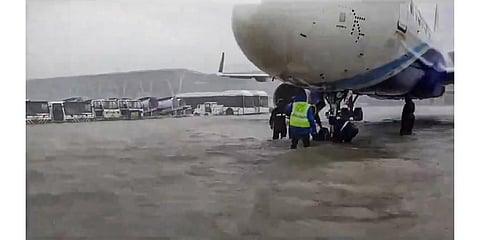 Chennai Airport runway inundated amid incessant rains triggered by Cyclone Michaung. (Photo | PTI)