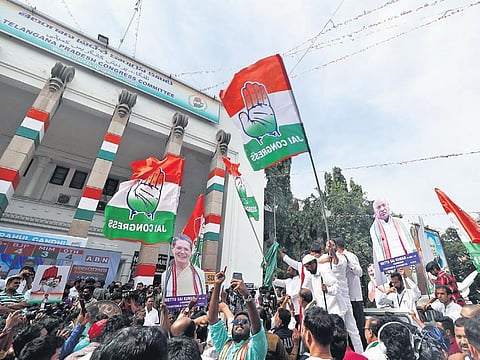 Congress workers celebrate the party’s victory in the Telangana Assembly elections | Sri Loganathan Velmurugan