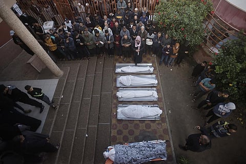 Palestinians attend a funeral of their relatives killed in the Israeli bombardment of the Gaza Strip in Khan Younis, Wednesday, Dec. 6, 2023. (AP)
