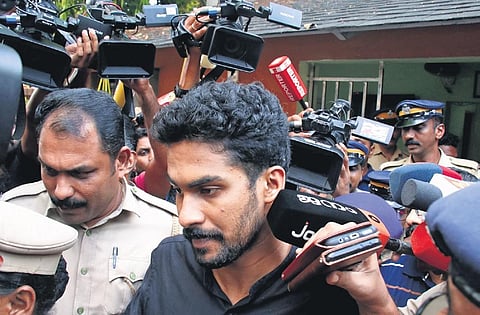 Police take Dr E A Ruwise from Medical College police station in Thiruvananthapuram to produce him at Vanchiyoor court | B P Deepu