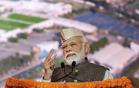 Prime Minister Narendra Modi addresses the gathering during the inauguration of 'Uttarakhand Global Investors Summit 2023', in Dehradun, Friday, Dec. 8, 2023. (PTI Photo)