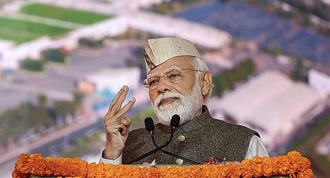 Prime Minister Narendra Modi addresses the gathering during the inauguration of 'Uttarakhand Global Investors Summit 2023', in Dehradun, Friday, Dec. 8, 2023. (PTI )