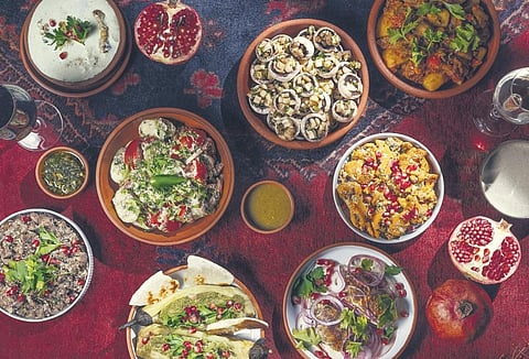 A supra comprising cold dishes and salads.