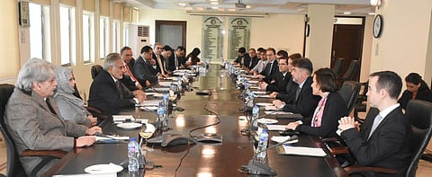 Pakistan’s Finance Minister Ishaq Dar (L) meets with IMF team review mission team in Islamabad, Jan. 31, 2023. (Photo | AFP)
