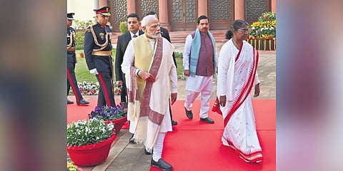 President Droupadi Murmu, along with PM Narendra Modi, proceeds to address the joint session of Parliament on Tuesday. (Photo | Shekhar Yadav )