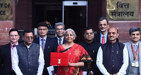 Finance Minister Nirmala Sitharaman with the Budget Papers outside Finance Ministry in New Delhi on Wednesday. (Express Photo by Parveen Negi)
