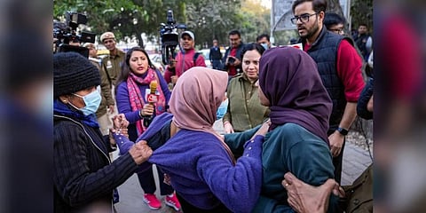 Police personnel detain members of Bhim Army Student Federation for planning to screen the BBC documentary 'India: The Modi Question', outside Delhi University Arts Faculty on January 2023. (Pic| PTI)