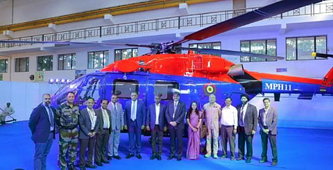 Nikhil Dwivedi, GM, HAL Helicopter Division hands over the certificate of an ALH to A K Dip, Commissioner of Police, Mauritius Police Force (MPF)