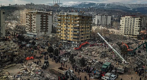 This aerial view shows collapsed buildings during the ongoing rescue operation in Kahramanmaras, the epicentre of the first 7.8-magnitude tremor five days ago. (Photo | AFP)