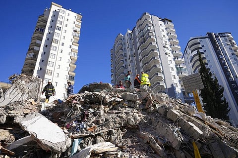 Emergency teams search for people in the rubble of a destroyed building in Adana, southern Turkey (File Photo | AP)