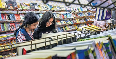 Students taking a look at books during 33rd V’wada book fest | Prasant Madugula