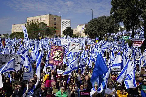 Israelis protest against plans by Prime Minister Benjamin Netanyahu's new government to overhaul the judicial system, outside the Knesset in Jerusalem, Monday, Feb. 13, 2023. (Photo | AP)