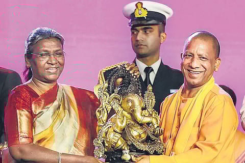 President Droupadi Murmu being felicitated by UP CM Yogi Adityanath at the closing ceremony of UP Global Investors Summit on Sunday | pti