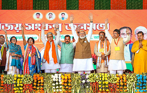PM Narendra Modi with Tripura CM Manik Saha and others during an election campaign rally ahead of the Tripura Assembly elections, in Agartala, Feb. 13, 2023. (Photo | PTI)